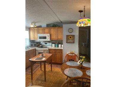 PRICE DROP! Welcome to this charming well maintained and on Lake Henry Golf Club in Florida - for sale on GolfHomes.com, golf home, golf lot
