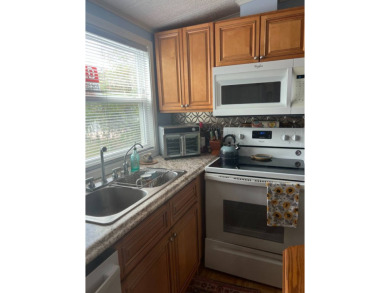 PRICE DROP! Welcome to this charming well maintained and on Lake Henry Golf Club in Florida - for sale on GolfHomes.com, golf home, golf lot