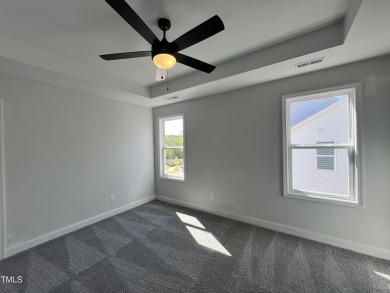 Schedule your tour of this beautiful new home in Clayton's on Riverwood Golf and Athletic Club in North Carolina - for sale on GolfHomes.com, golf home, golf lot