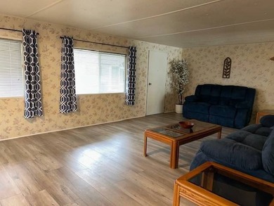 Amazing 3 bedroom, 2 full-bath double-wide could be yours in on Wedgewood Golf Club in Florida - for sale on GolfHomes.com, golf home, golf lot