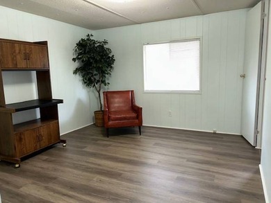 Amazing 3 bedroom, 2 full-bath double-wide could be yours in on Wedgewood Golf Club in Florida - for sale on GolfHomes.com, golf home, golf lot