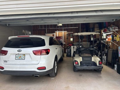 2 BEDROOM, 2 BATHROOM, SUNROOM, DEEP DRIVEWAY, GOLF CART This on Scotland Yards Golf Club in Florida - for sale on GolfHomes.com, golf home, golf lot