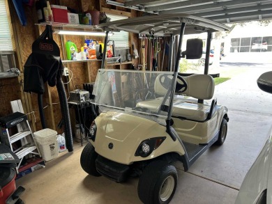 2 BEDROOM, 2 BATHROOM, SUNROOM, DEEP DRIVEWAY, GOLF CART This on Scotland Yards Golf Club in Florida - for sale on GolfHomes.com, golf home, golf lot