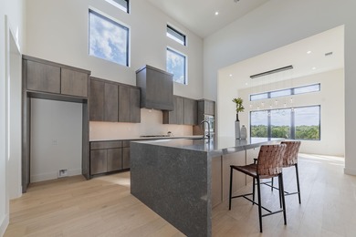 LUXURY LIVING IN TUSCAN VILLAGE--CONTEMPORARY CRESCENT ESTATES on Summit Rock Golf Course in Texas - for sale on GolfHomes.com, golf home, golf lot