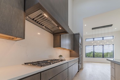 LUXURY LIVING IN TUSCAN VILLAGE--CONTEMPORARY CRESCENT ESTATES on Summit Rock Golf Course in Texas - for sale on GolfHomes.com, golf home, golf lot