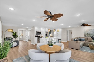 Experience elevated Florida living in this breathtaking, fully on Highland Lakes Executive Golf Course in Florida - for sale on GolfHomes.com, golf home, golf lot