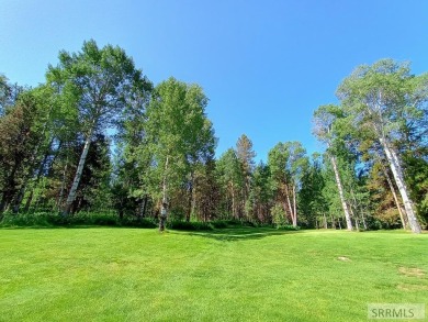 Beautiful wooded lot on the 3rd green of the Timberline Golf on Timberline Golf Course in Idaho - for sale on GolfHomes.com, golf home, golf lot