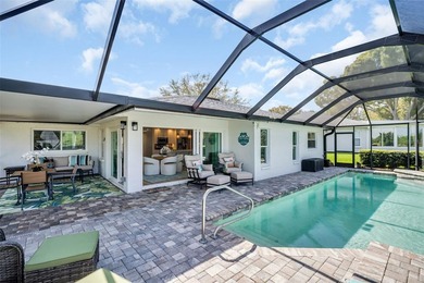 Experience elevated Florida living in this breathtaking, fully on Highland Lakes Executive Golf Course in Florida - for sale on GolfHomes.com, golf home, golf lot