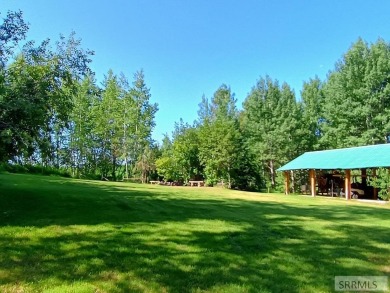 Beautiful wooded lot on the 3rd green of the Timberline Golf on Timberline Golf Course in Idaho - for sale on GolfHomes.com, golf home, golf lot