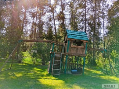 Beautiful wooded lot on the 3rd green of the Timberline Golf on Timberline Golf Course in Idaho - for sale on GolfHomes.com, golf home, golf lot