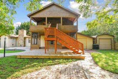 This lovely home in Forest Hills comes with its own fish, flower on Babe Zaharias Golf Course in Florida - for sale on GolfHomes.com, golf home, golf lot