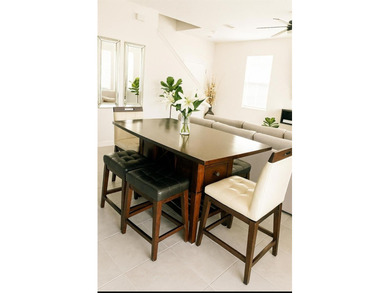 2022 all-block townhome in the highly sought-after Venetian Bay on Venetian Bay Golf Course in Florida - for sale on GolfHomes.com, golf home, golf lot