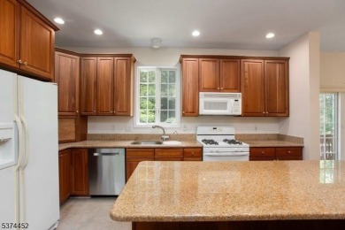 Welcome to this sun-filled 4-bedroom Colonial backing to the on Warrenbrook Golf Course in New Jersey - for sale on GolfHomes.com, golf home, golf lot