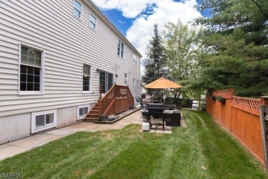 Welcome to this sun-filled 4-bedroom Colonial backing to the on Warrenbrook Golf Course in New Jersey - for sale on GolfHomes.com, golf home, golf lot
