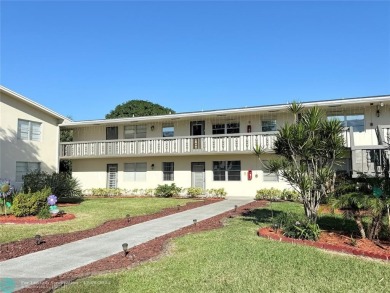 REDUCED TO SELL! Very well maintained & very clean 1 bed 1.5 on Hillsboro Pines Golf in Florida - for sale on GolfHomes.com, golf home, golf lot