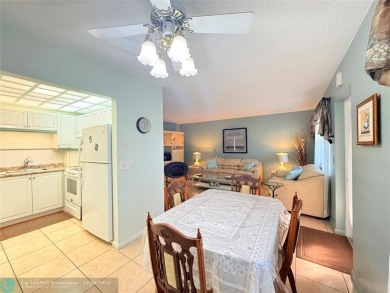 REDUCED TO SELL! Very well maintained & very clean 1 bed 1.5 on Hillsboro Pines Golf in Florida - for sale on GolfHomes.com, golf home, golf lot