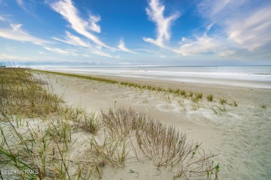 Welcome home to this ocean side cottage in the desirable Ocean on The Country Club of the Crystal Coast in North Carolina - for sale on GolfHomes.com, golf home, golf lot