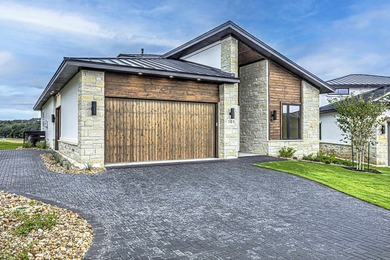 LOCK AND LEAVE CUSTOM HOME IN THE VILLA SECTION OF TUSCAN on Summit Rock Golf Course in Texas - for sale on GolfHomes.com, golf home, golf lot