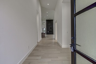 LOCK AND LEAVE CUSTOM HOME IN THE VILLA SECTION OF TUSCAN on Summit Rock Golf Course in Texas - for sale on GolfHomes.com, golf home, golf lot