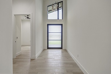 LOCK AND LEAVE CUSTOM HOME IN THE VILLA SECTION OF TUSCAN on Summit Rock Golf Course in Texas - for sale on GolfHomes.com, golf home, golf lot