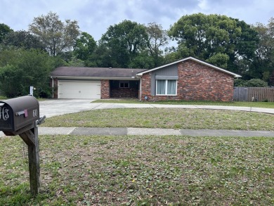 A must see in person exceptional home with loads of bells and on Fort Walton Beach Golf Course in Florida - for sale on GolfHomes.com, golf home, golf lot