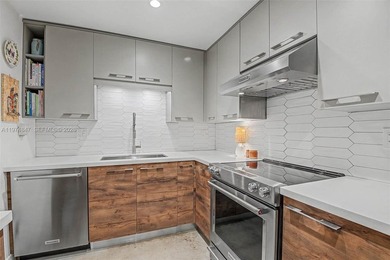 Completely renovated and rarely available first-floor residence on Granada Golf Club in Florida - for sale on GolfHomes.com, golf home, golf lot