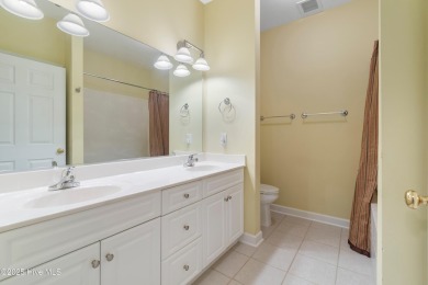This 3 BR, 2.5 bathroom Osprey Ridge end unit condo in the on Sea Trail Golf Resort in North Carolina - for sale on GolfHomes.com, golf home, golf lot
