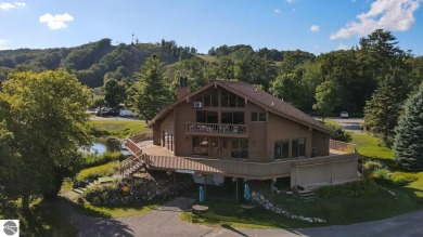 Stunning 3-Bedroom Penthouse Condo Overlooking Golf Course at on Schuss Mountain Golf Club in Michigan - for sale on GolfHomes.com, golf home, golf lot