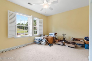 This 3 BR, 2.5 bathroom Osprey Ridge end unit condo in the on Sea Trail Golf Resort in North Carolina - for sale on GolfHomes.com, golf home, golf lot