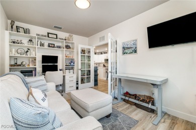 Impeccable, upgrade-rich, and truly move-in ready-this lakefront on Herons Glen Golf and Country Club in Florida - for sale on GolfHomes.com, golf home, golf lot