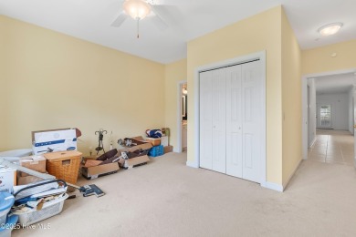 This 3 BR, 2.5 bathroom Osprey Ridge end unit condo in the on Sea Trail Golf Resort in North Carolina - for sale on GolfHomes.com, golf home, golf lot