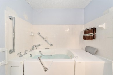 This end unit is unique with the wide open greenspace around on On Top of the World Golf Course in Florida - for sale on GolfHomes.com, golf home, golf lot