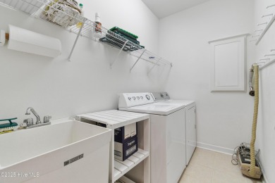 This 3 BR, 2.5 bathroom Osprey Ridge end unit condo in the on Sea Trail Golf Resort in North Carolina - for sale on GolfHomes.com, golf home, golf lot