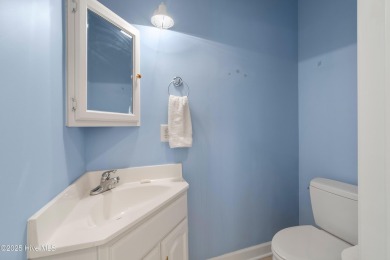 This 3 BR, 2.5 bathroom Osprey Ridge end unit condo in the on Sea Trail Golf Resort in North Carolina - for sale on GolfHomes.com, golf home, golf lot