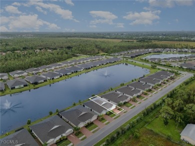 Impeccable, upgrade-rich, and truly move-in ready-this lakefront on Herons Glen Golf and Country Club in Florida - for sale on GolfHomes.com, golf home, golf lot