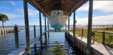 For buyers searching nationwide for true Florida waterfront with on Tiger Point Golf and Country Club in Florida - for sale on GolfHomes.com, golf home, golf lot