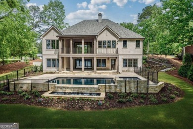 Welcome to your dream home, where timeless European charm meets on Reynolds Lake Oconee - The Landing in Georgia - for sale on GolfHomes.com, golf home, golf lot