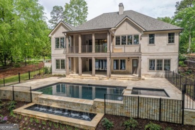Welcome to your dream home, where timeless European charm meets on Reynolds Lake Oconee - The Landing in Georgia - for sale on GolfHomes.com, golf home, golf lot