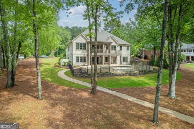 Welcome to your dream home, where timeless European charm meets on Reynolds Lake Oconee - The Landing in Georgia - for sale on GolfHomes.com, golf home, golf lot