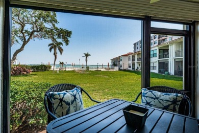 Tastefully remodeled in 2022 with high-end finishes, this ground on Isla Del Sol Yacht and Country Club in Florida - for sale on GolfHomes.com, golf home, golf lot