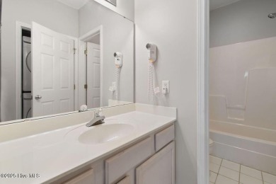 This third floor Royal Poste golf front condo in the vibrant on Sea Trail Golf Resort in North Carolina - for sale on GolfHomes.com, golf home, golf lot