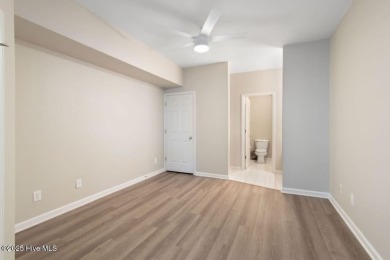 This third floor Royal Poste golf front condo in the vibrant on Sea Trail Golf Resort in North Carolina - for sale on GolfHomes.com, golf home, golf lot