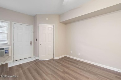 This third floor Royal Poste golf front condo in the vibrant on Sea Trail Golf Resort in North Carolina - for sale on GolfHomes.com, golf home, golf lot