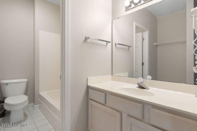 This third floor Royal Poste golf front condo in the vibrant on Sea Trail Golf Resort in North Carolina - for sale on GolfHomes.com, golf home, golf lot