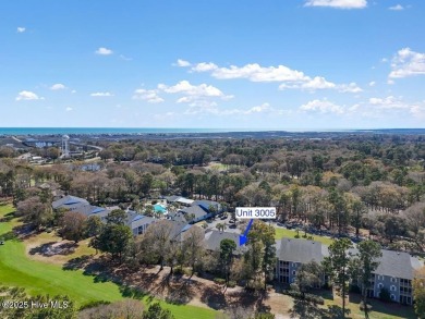 This third floor Royal Poste golf front condo in the vibrant on Sea Trail Golf Resort in North Carolina - for sale on GolfHomes.com, golf home, golf lot