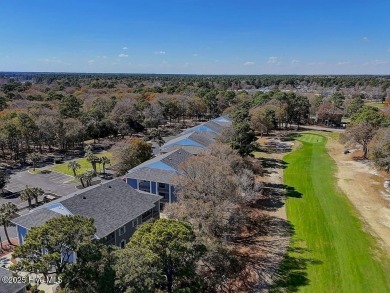 This third floor Royal Poste golf front condo in the vibrant on Sea Trail Golf Resort in North Carolina - for sale on GolfHomes.com, golf home, golf lot