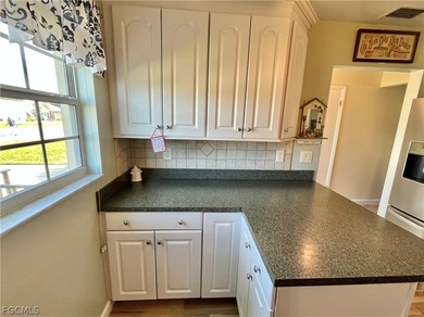 **FURNISHED END UNIT RIGHT ON THE MYERLEE COUNTRY CLUB GOLF on Myerlee Country Club in Florida - for sale on GolfHomes.com, golf home, golf lot