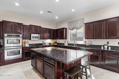 Just a golf cart ride from Seville Country Club, this on Seville Golf and Country Club in Arizona - for sale on GolfHomes.com, golf home, golf lot