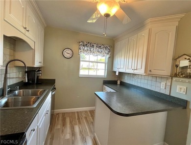 **FURNISHED END UNIT RIGHT ON THE MYERLEE COUNTRY CLUB GOLF on Myerlee Country Club in Florida - for sale on GolfHomes.com, golf home, golf lot