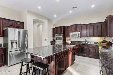 Just a golf cart ride from Seville Country Club, this on Seville Golf and Country Club in Arizona - for sale on GolfHomes.com, golf home, golf lot